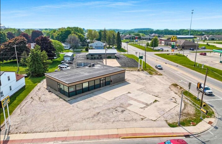 Primary Photo Of 107 Main St, Luxemburg Convenience Store For Sale