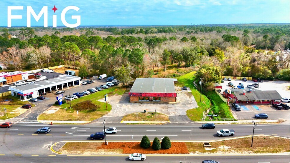 Primary Photo Of 6593 Caroline St, Milton Freestanding For Sale