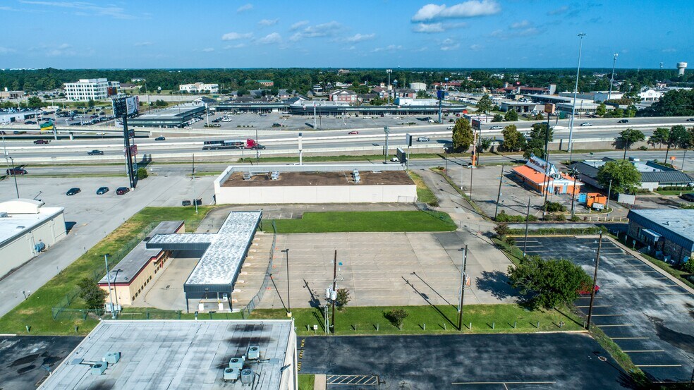 Primary Photo Of 123 W Main St, Humble Storefront For Sale