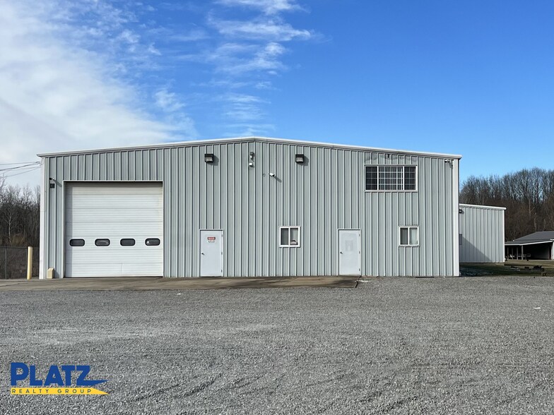 Primary Photo Of 3603 Larchmont NE ave, Warren Warehouse For Sale