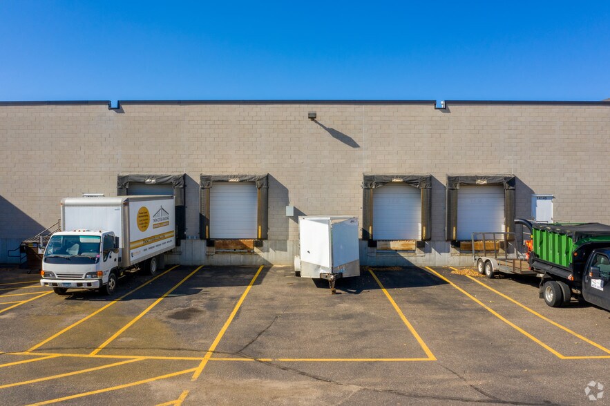 More Photos Of 14140-14198 Northdale Blvd, Rogers Showroom For Lease