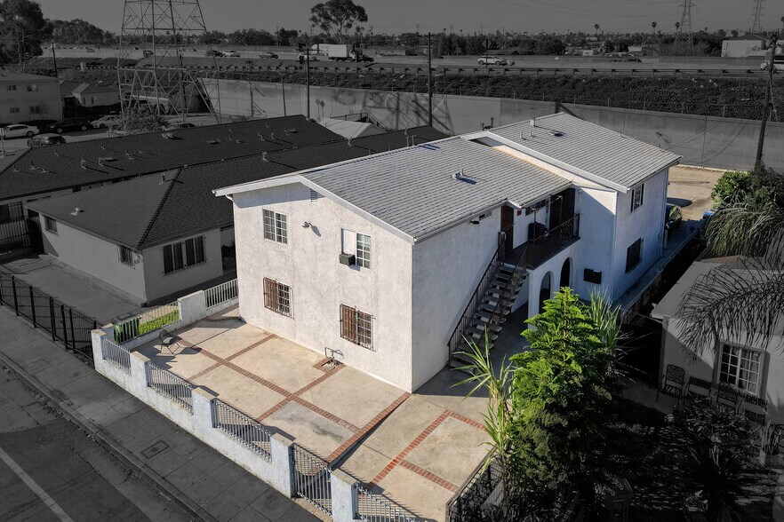 Primary Photo Of 9715 S Broadway, Los Angeles Multifamily For Sale