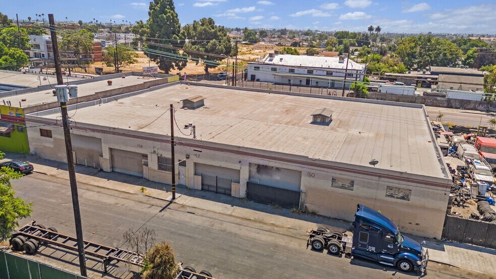 Primary Photo Of 150-154 E 58th St, Los Angeles Manufacturing For Sale