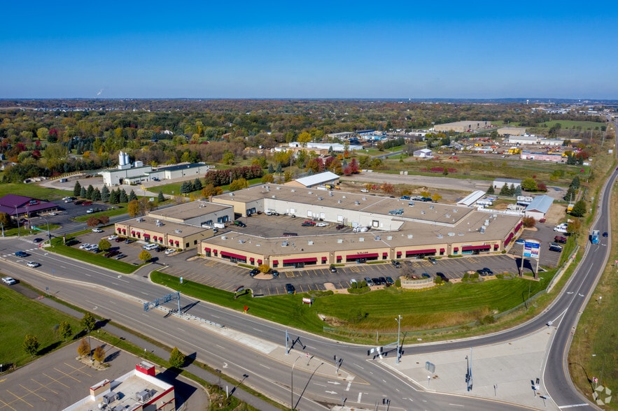 More Photos Of 14140-14198 Northdale Blvd, Rogers Showroom For Lease