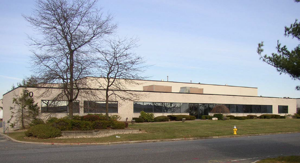 Primary Photo Of 50 Commerce Dr, Hauppauge Warehouse For Lease