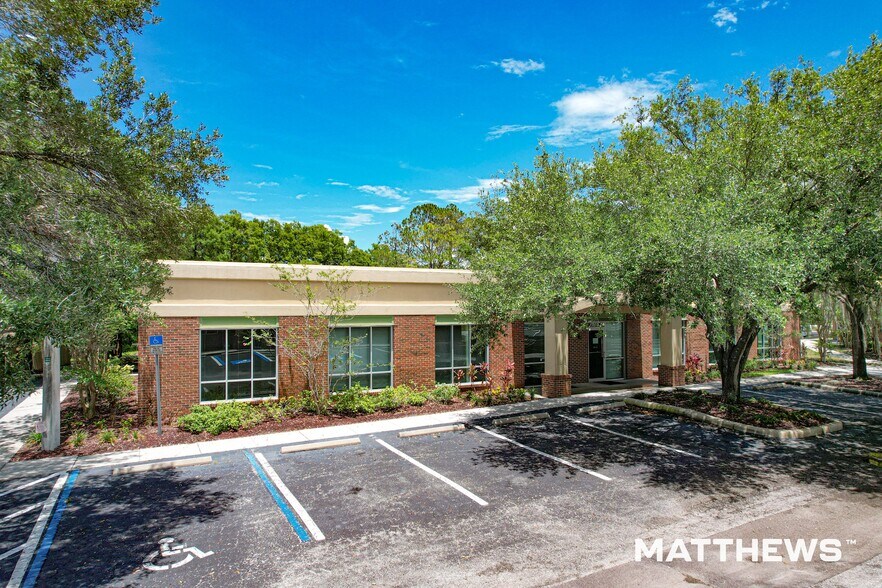Primary Photo Of 13075-13079 N Telecom Pky, Tampa Office For Sale