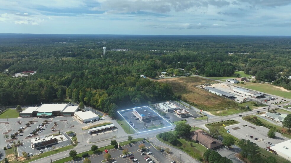 Primary Photo Of 1006 Monroe St, Carthage Freestanding For Sale