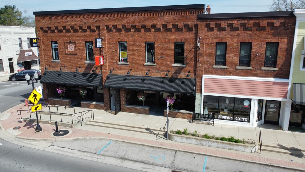 Primary Photo Of 103-109 E Main St, Pinckney Storefront Retail Office For Sale