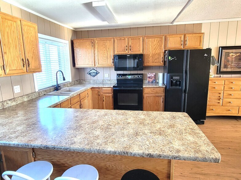 More Photos Of 7526 County Road 50, Center Hospitality For Sale