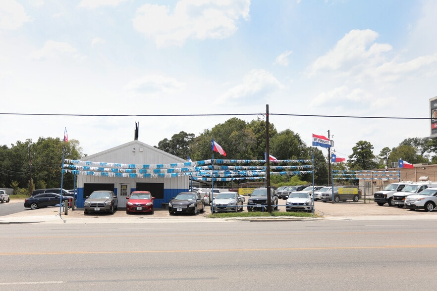 Primary Photo Of 815 E Davis St, Conroe Auto Dealership For Sale