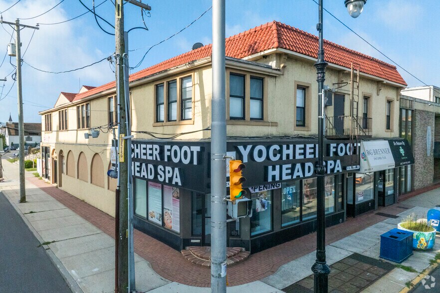 Primary Photo Of 78-84 E Park Ave, Long Beach Storefront For Sale