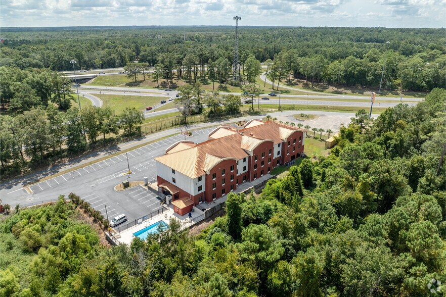 More Photos Of 215 Commerce Blvd, Midway Hotel For Sale