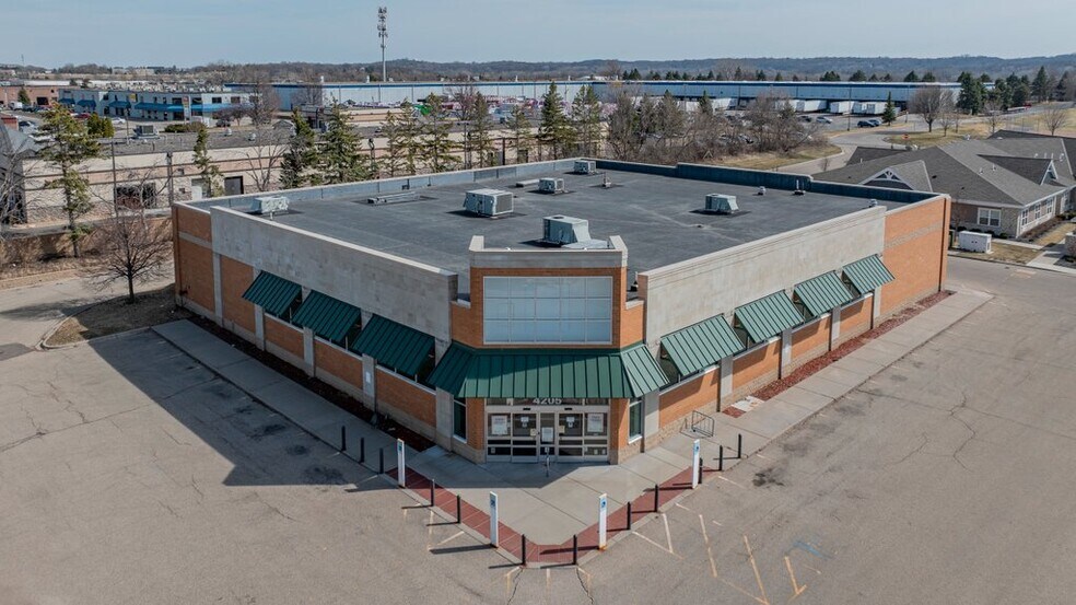 Primary Photo Of 4205-4225 Egan Dr, Savage Drugstore For Sale