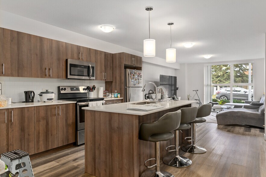 More Photos Of 303 Waddy Lane, Strathmore Multifamily For Sale