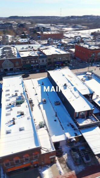 Primary Photo Of 409 S Main St, Rochester Storefront For Sale