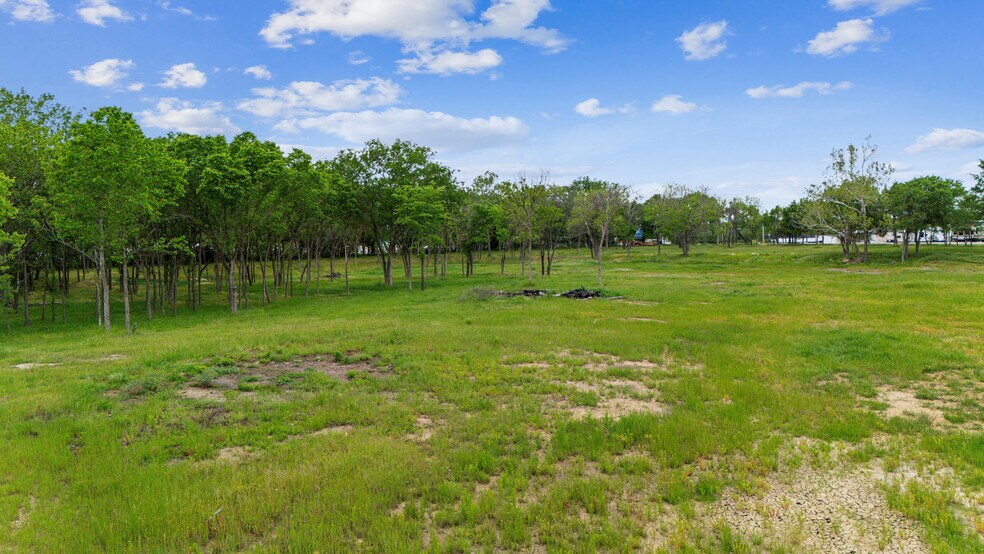 More Photos Of 25421 US-59, Grove Land For Sale