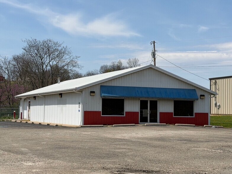 Primary Photo Of 95 Wildflower Dr, New Concord Auto Repair For Sale