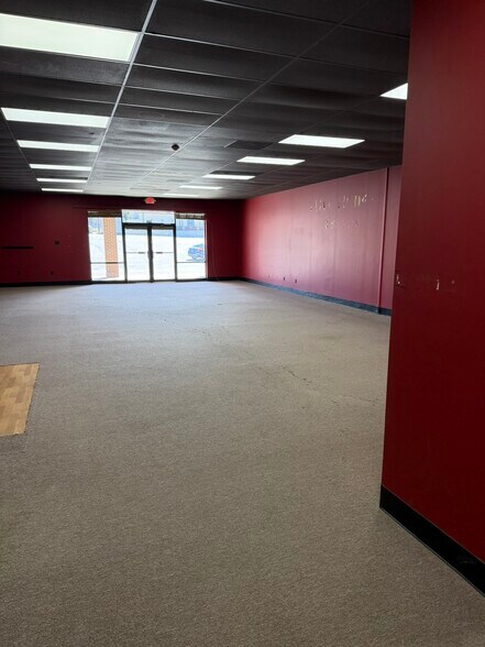 More Photos Of 200 W Clinton St, Gray Storefront For Lease