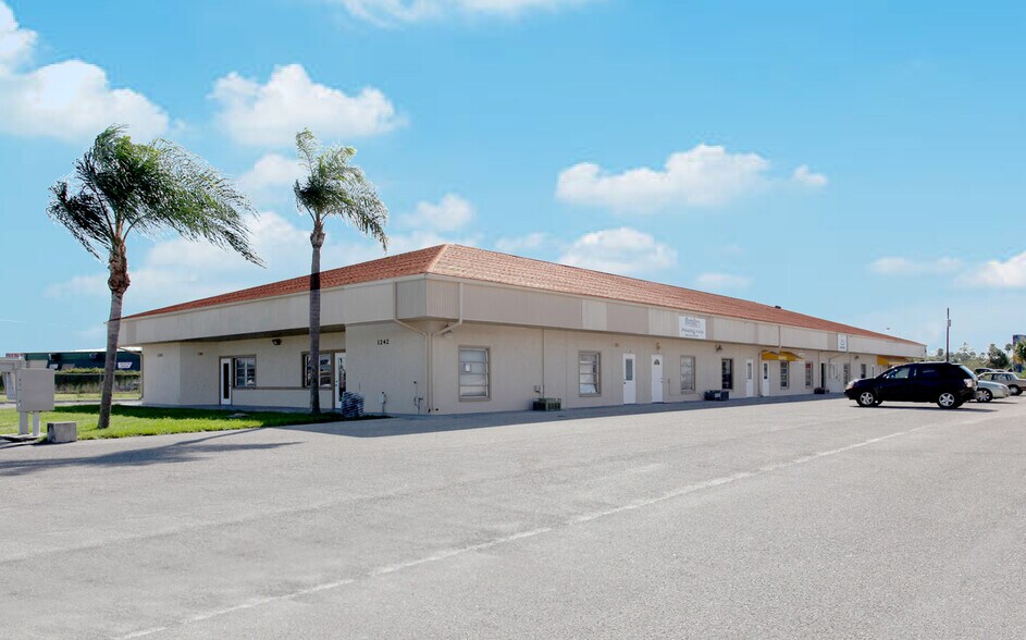 Primary Photo Of 1242 Market Cir, Port Charlotte Warehouse For Sale