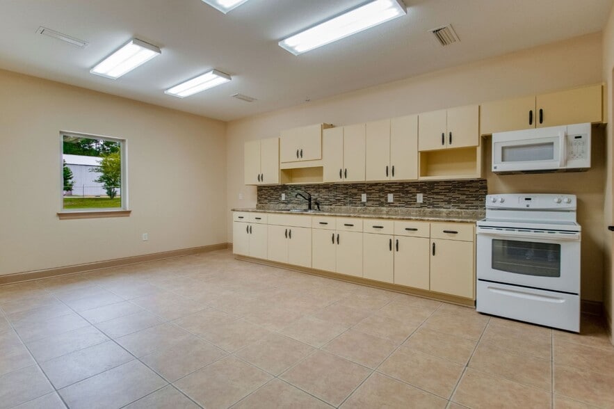 More Photos Of 8100 Opportunity Dr, Milton Office For Sale