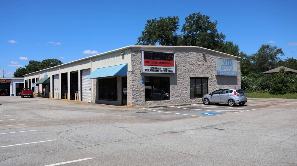 Primary Photo Of 304 Buford Dr NE, Lawrenceville Auto Repair For Sale