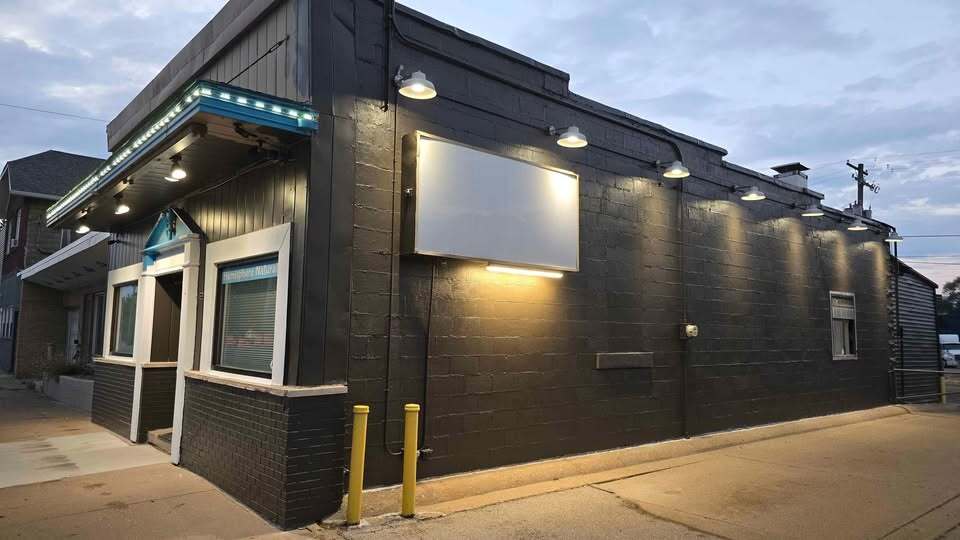 Primary Photo Of 213 E Washington St, East Peoria General Retail For Sale