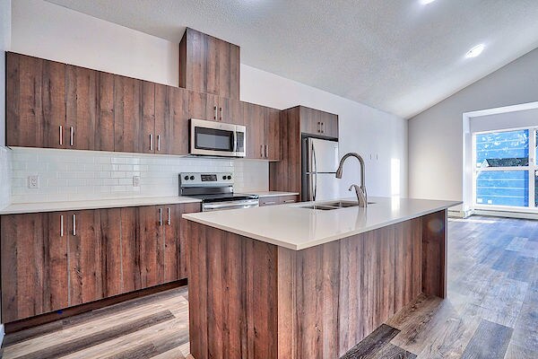 More Photos Of 303 Waddy Lane, Strathmore Multifamily For Sale