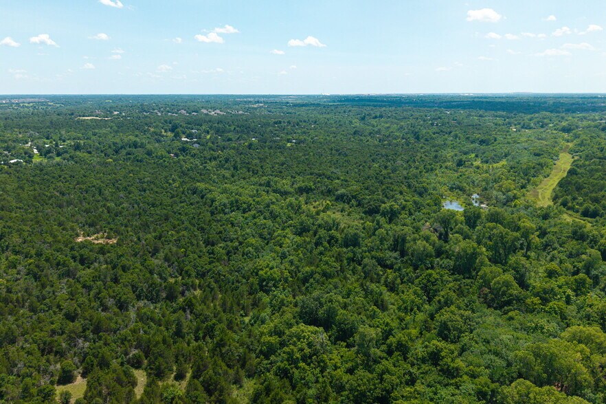 More Photos Of NE 10th and N Anderson Road, Choctaw Land For Sale