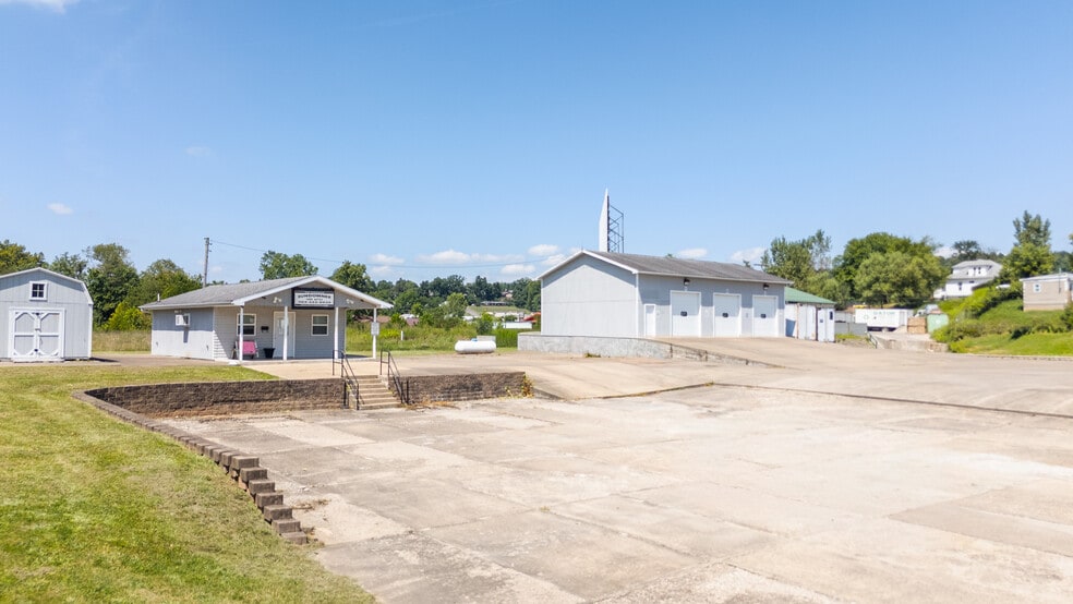Primary Photo Of 1025 Gihon Rd, Parkersburg Auto Repair For Sale