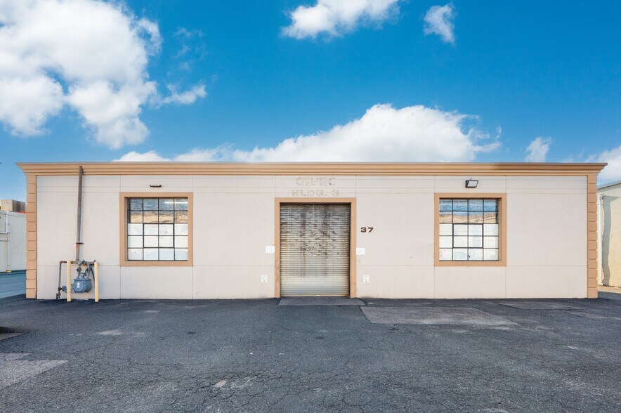Primary Photo Of 36 Sylvester St, Westbury Manufacturing For Lease