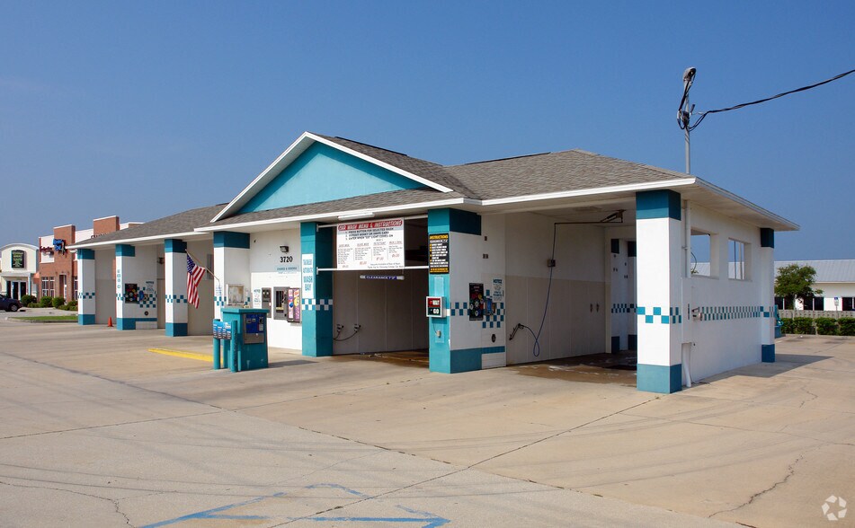 Primary Photo Of 3720 N Wickham Rd, Melbourne Carwash For Sale