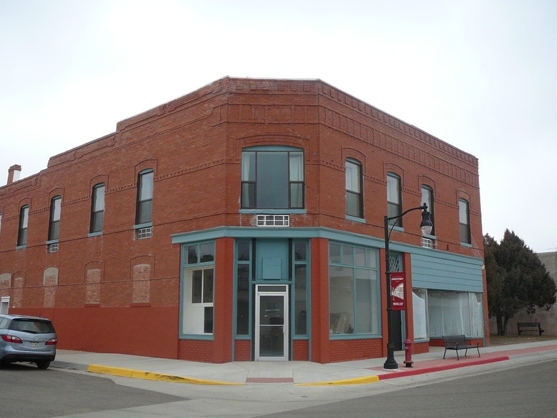 Primary Photo Of 128 S Main St, Holly Hotel For Sale