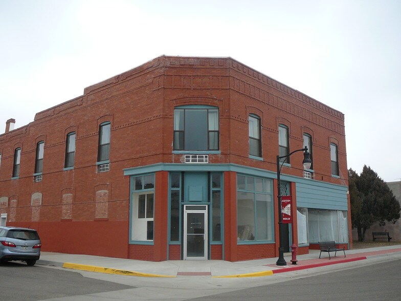 Primary Photo Of 128 S Main St, Holly Hotel For Sale