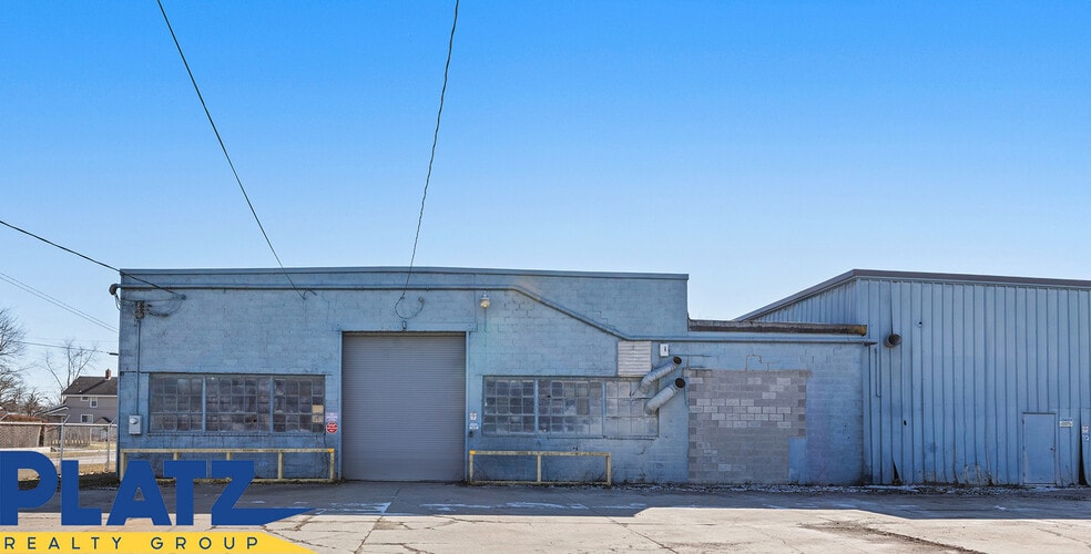 More Photos Of 1929 Larchmont Ave NE, Warren Warehouse For Sale