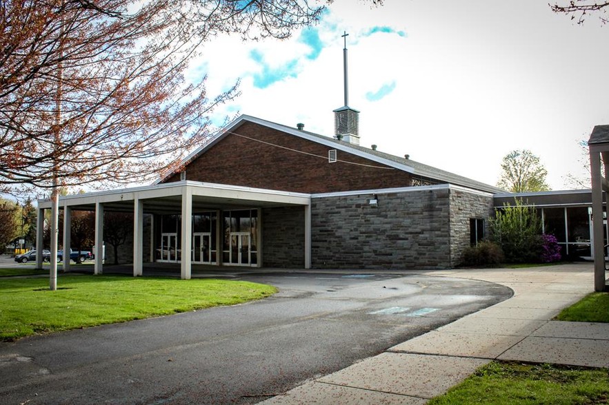 Primary Photo Of 306 W Main St, Malone Office For Sale