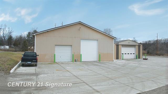 Primary Photo Of 210 Industrial Dr, Flushing Warehouse For Sale