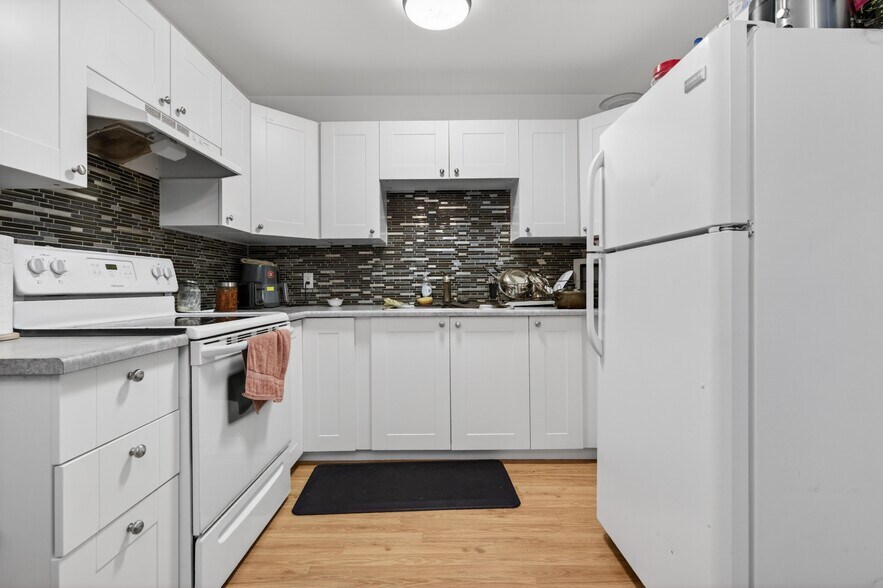 More Photos Of 5015 48 St, Legal Apartments For Sale