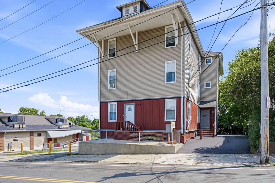 Primary Photo Of 139 E School St, Woonsocket Apartments For Sale