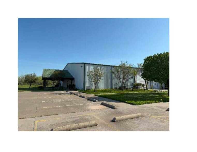 Primary Photo Of 1850 N Stemmons St, Sanger Industrial For Sale