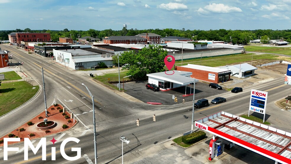 More Photos Of 101 E Cumming Ave, Opp Mixed Retail For Sale