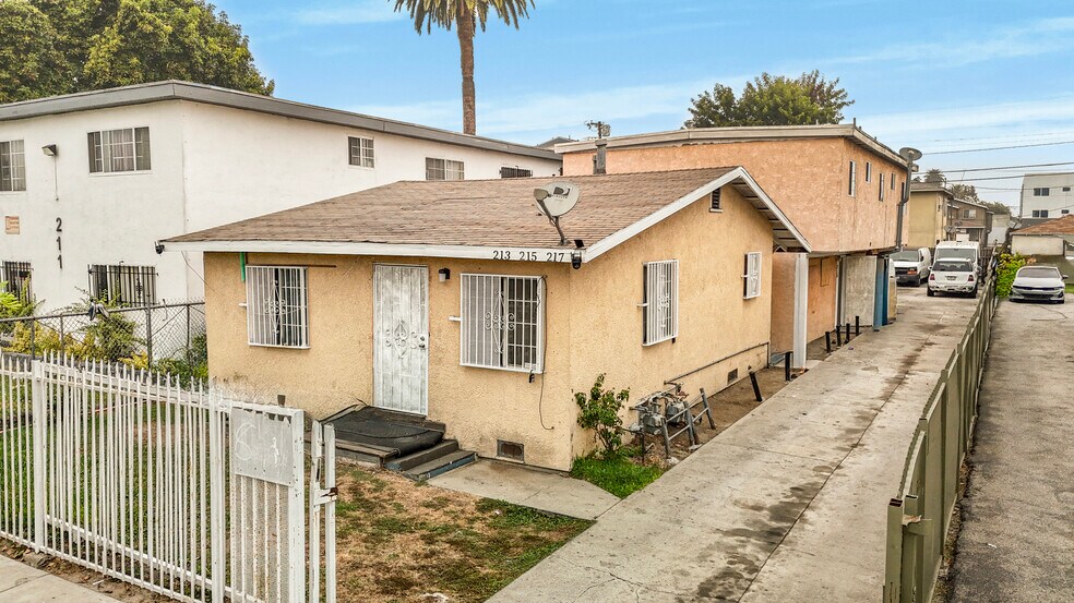 Primary Photo Of 213 E 87th Pl, Los Angeles Multifamily For Sale