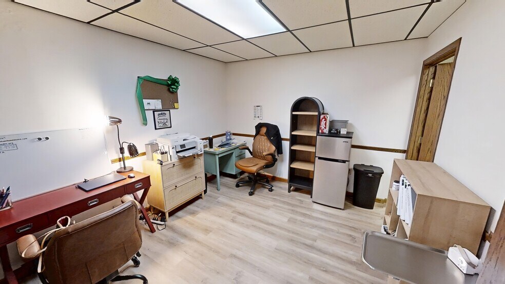 More Photos Of 103-105 E 27th St, Hays Office For Sale