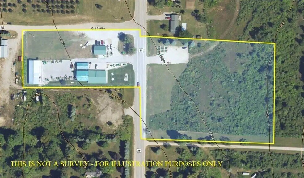 More Photos Of 9821 N US Highway 31, Ellsworth Showroom For Sale