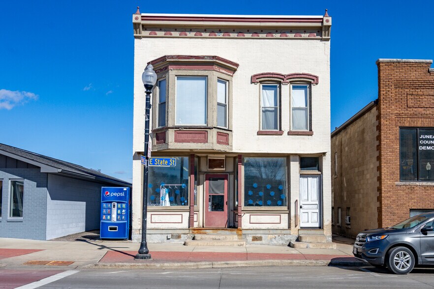 Primary Photo Of 207 E State St, Mauston Storefront Retail Residential For Sale