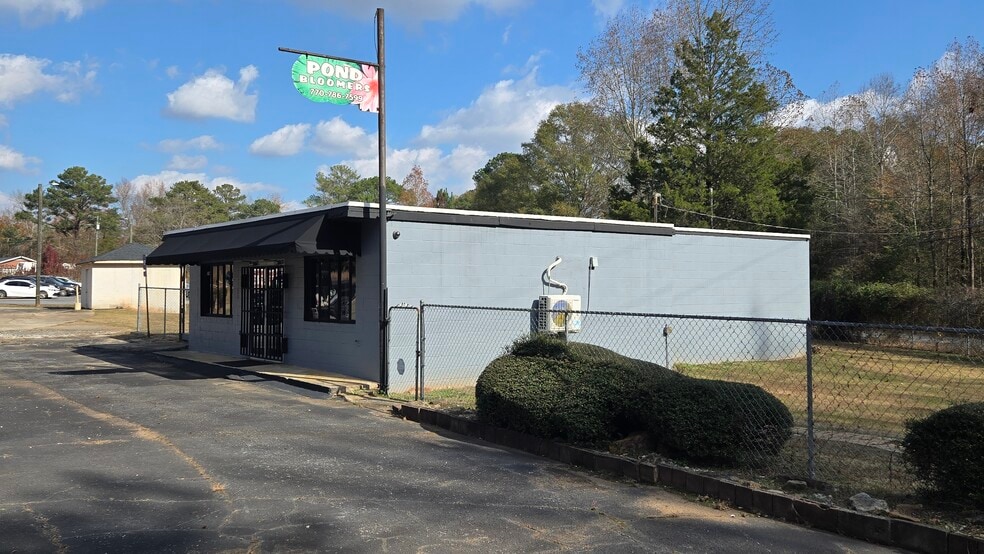 Primary Photo Of 5748 Highway 20 S, Covington Storefront Retail Office For Sale