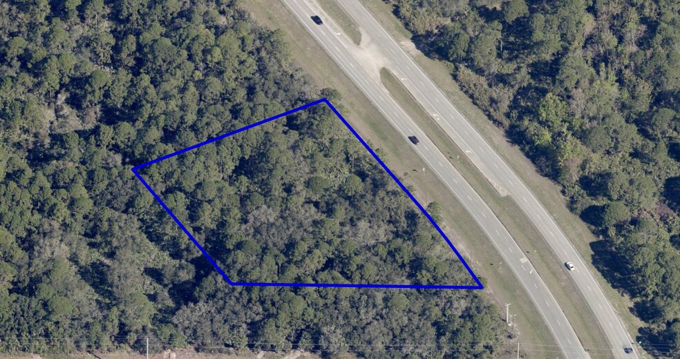 Primary Photo Of WILLOW CREEK COMMERCIAL CENTER PHASE 1 LOT, Titusville Land For Sale