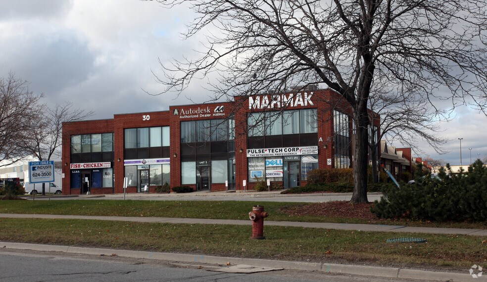 More Photos Of 30 Intermodal Dr, Brampton Showroom For Lease