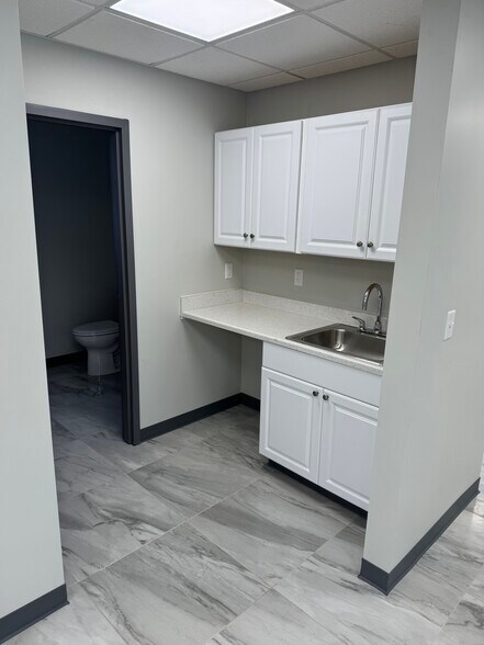 More Photos Of 13439 Woodworth Rd, New Springfield Office For Lease