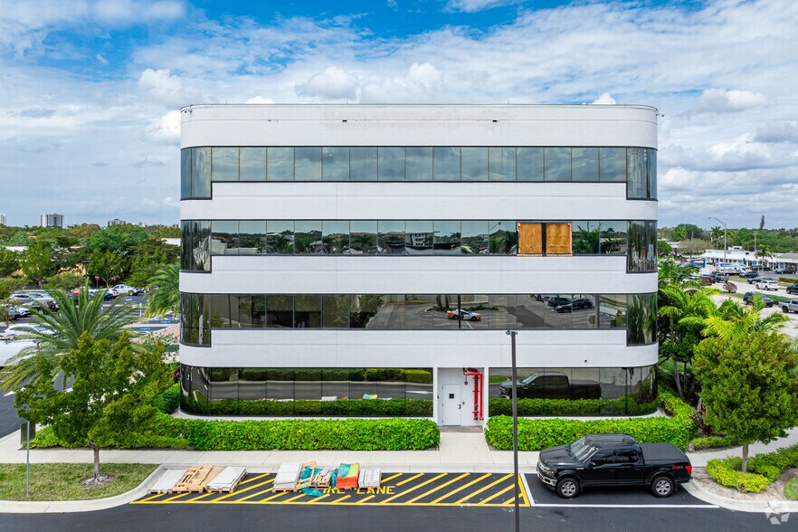 Primary Photo Of 4501 Tamiami Trl N, Naples Office For Lease