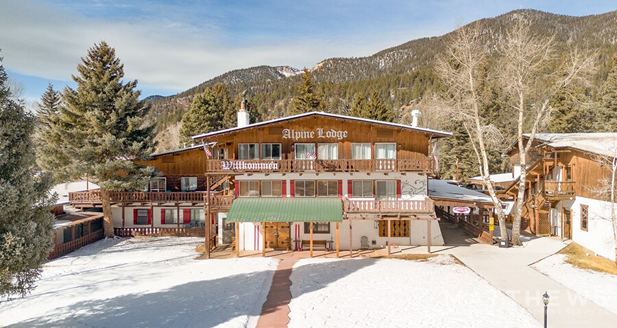 Primary Photo Of 417 W Main St, Red River Hotel For Sale